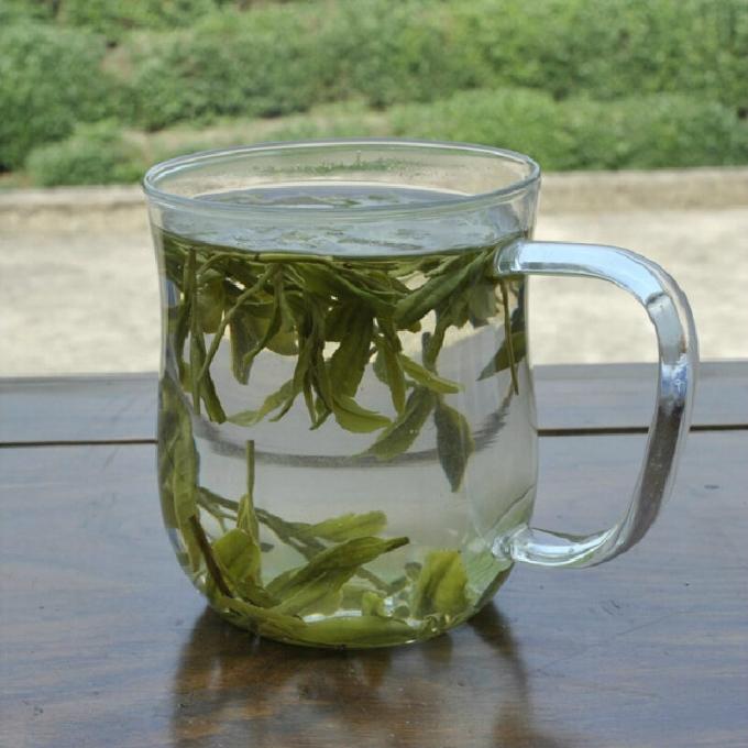 긴장과 불안의 자루에 넣어진 중국 녹차 Longjing 녹차 기복 증후